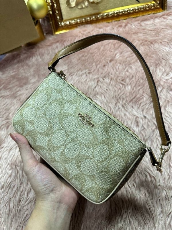 ORIG Preloved COACH Nolita 19 In Signature Canvas Small Khaki Saddle Bag