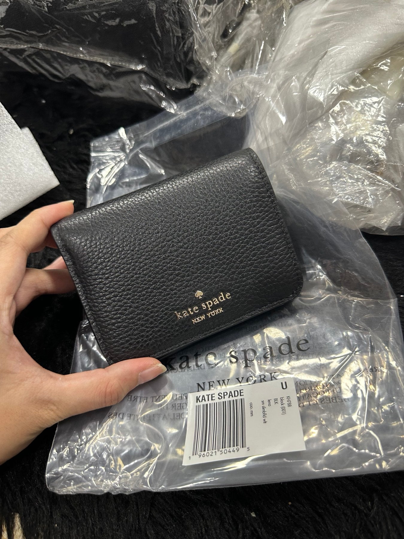 Kate orders Spade Wallet