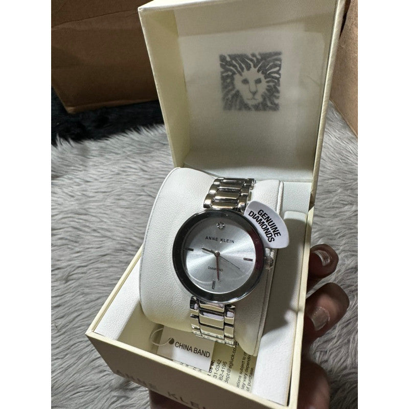 ORIG & IMPORTED AK Klein Women's AK/1363SVSV Diamond Dial Silver-Tone Bracelet Watch
