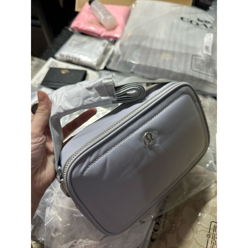 ORIG & IMPORTED Lululemon Crossbody Camera Bag 2L in Silver Drop