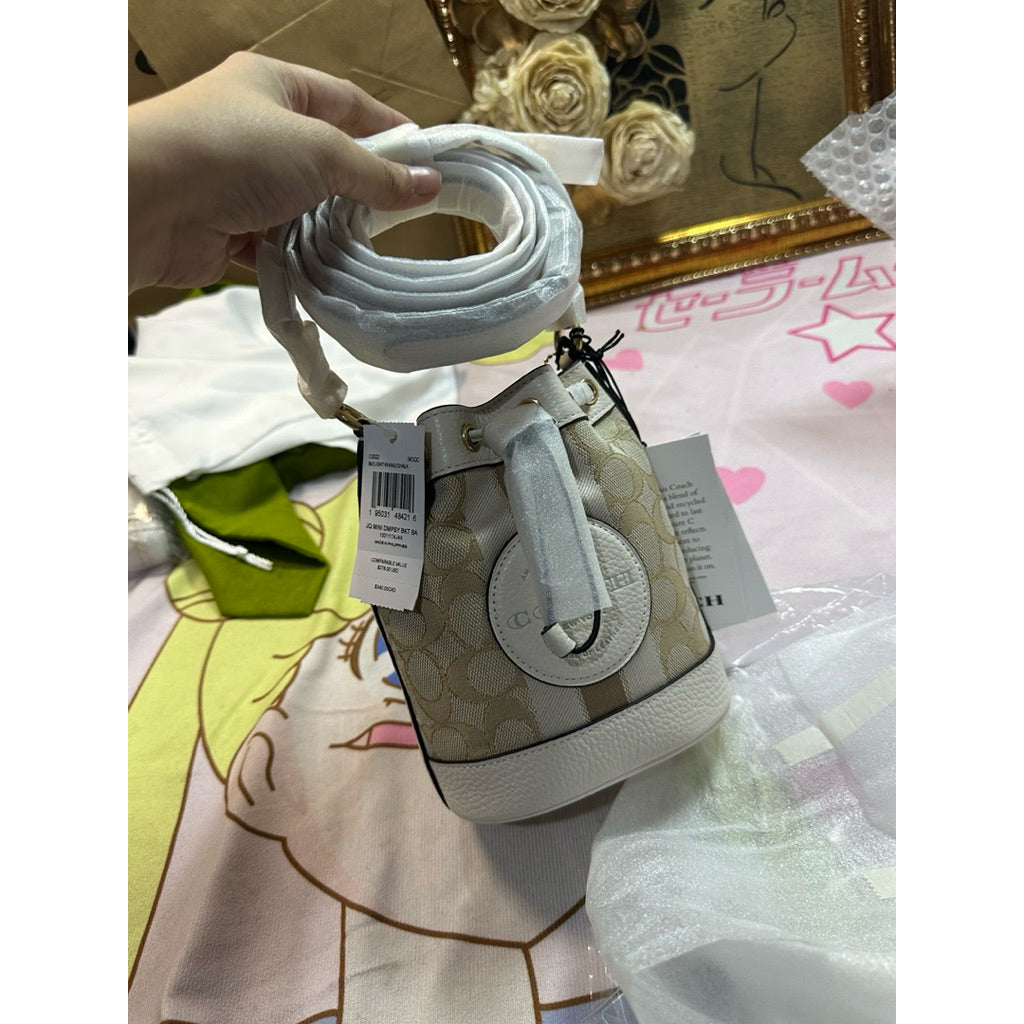 ORIG & IMPORTED CCH MINI DEMPSEY BUCKET WHITE BAG IN SIGNATURE JACQUARD
