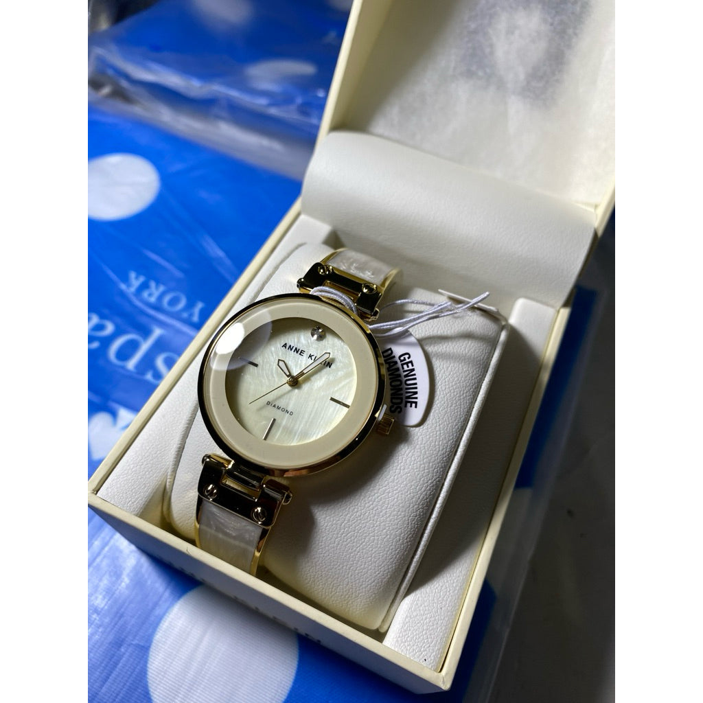 AK Klein AK/2512LPGB Diamond-Accented Gold-Tone and Blush Pink White Marbleized Bangle Watch