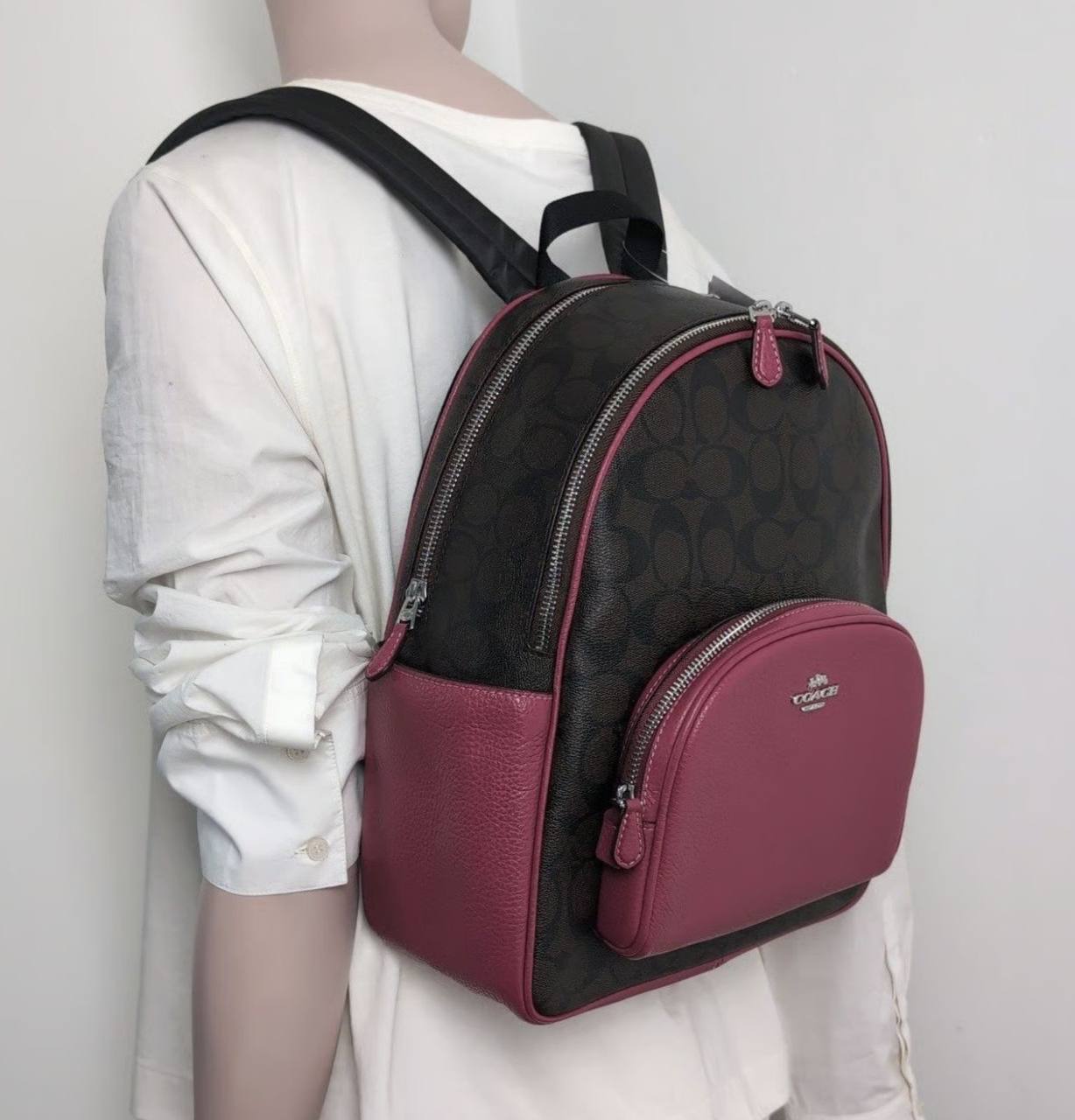 coach backpack dimension Court In Signature Canvas With Bow Print Refined pebble leather Inside zip cell phone and multifunction pockets Laptop compartment with zip closure Zip closure recycled polyester lining Top handle with 3 drop Outside zip pocket Luggage sleeve Adjustable shoulder straps Fits a 16 laptop 11 3/4 (L) x 16 1/2 (H) x 6 (W) Style No. Coach Outlet Large Court Backpack