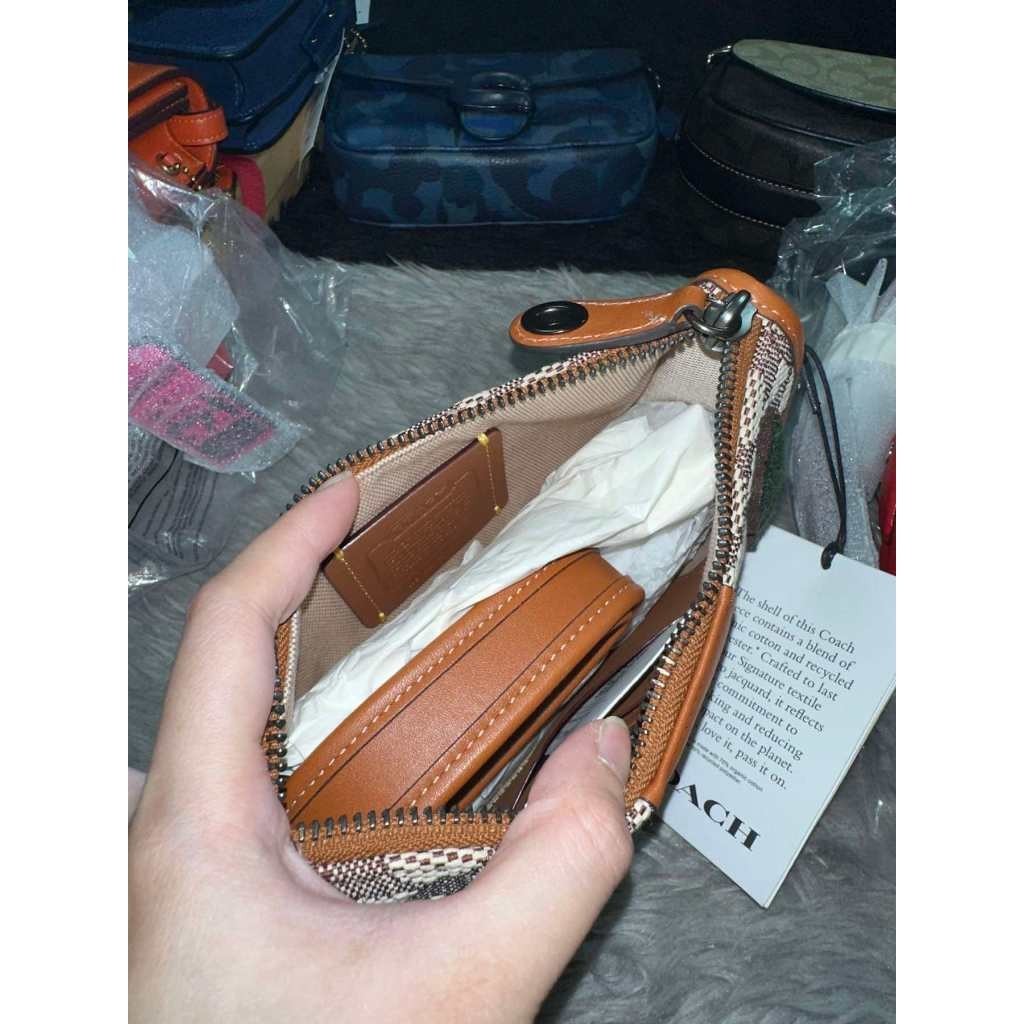 ORIG & IMPORTED CCH Retail Swinger 20 In Signature Jacquard With Varsity Patches Small Brown Bag