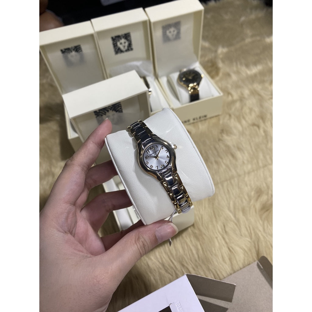 AUTHENTIC Anne Klein Women's 10-6777SVTT Two-Tone Dress Watch with an Easy to Read Dial