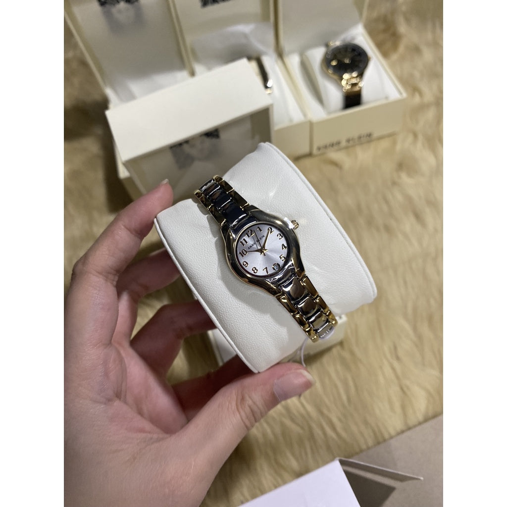 AUTHENTIC Anne Klein Women's 10-6777SVTT Two-Tone Dress Watch with an Easy to Read Dial