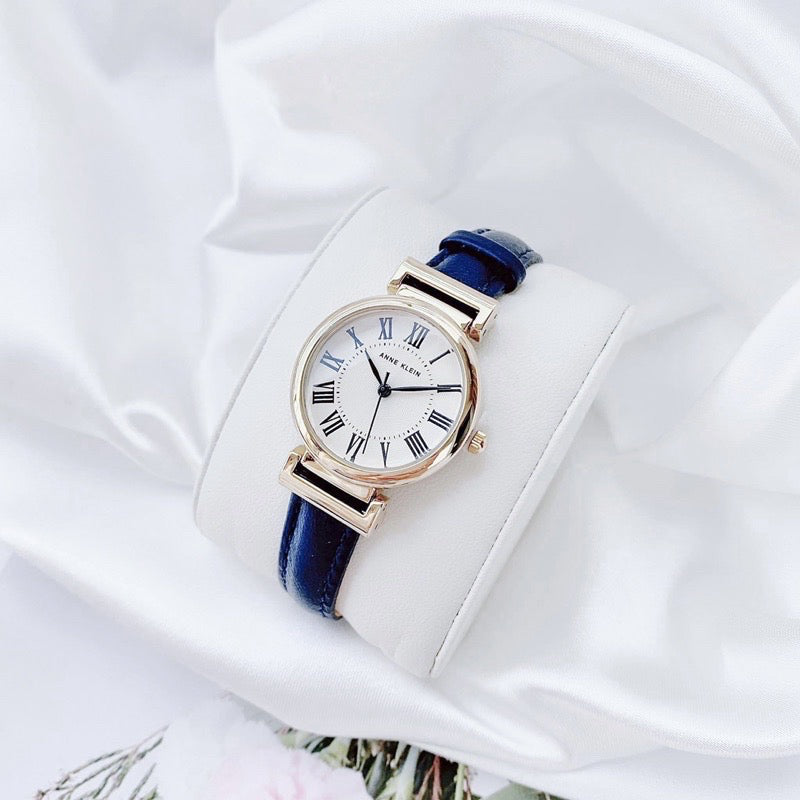 AUTHENTIC/ORIGINAL Anne Klein Women's AK/2246CRNV Gold-Tone and Navy Blue Leather Strap Watch