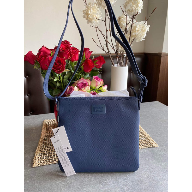 AUTHENTIC/ORIGINAL Lacoste Flat Crossbody Bag in Blue/Peacote