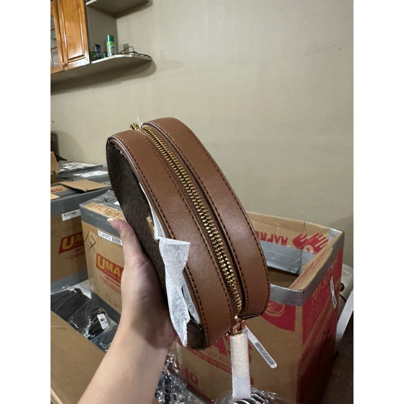 AUTHENTIC/ORIGINAL Michael K0rs MK Jet Set Glam Small Oval Crossbody Mini Bag Brown