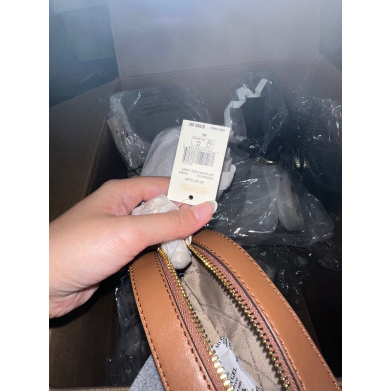 AUTHENTIC/ORIGINAL Michael K0rs MK Jet Set Glam Small Oval Crossbody Mini Bag Brown