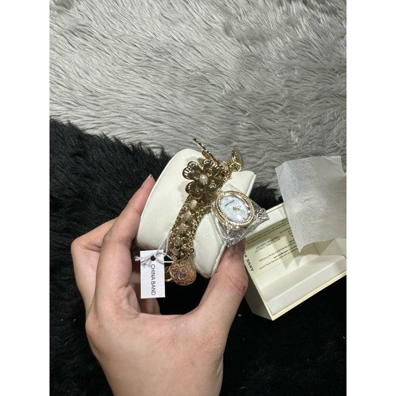 AUTHENTIC Anne Klein Women's Premium Crystal Accented Rose Gold-Tone Charm Bracelet Watch 8096RMCH