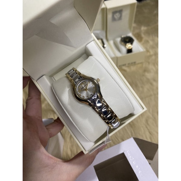 AUTHENTIC Anne Klein Women's 10-6777SVTT Two-Tone Dress Watch with an Easy to Read Dial