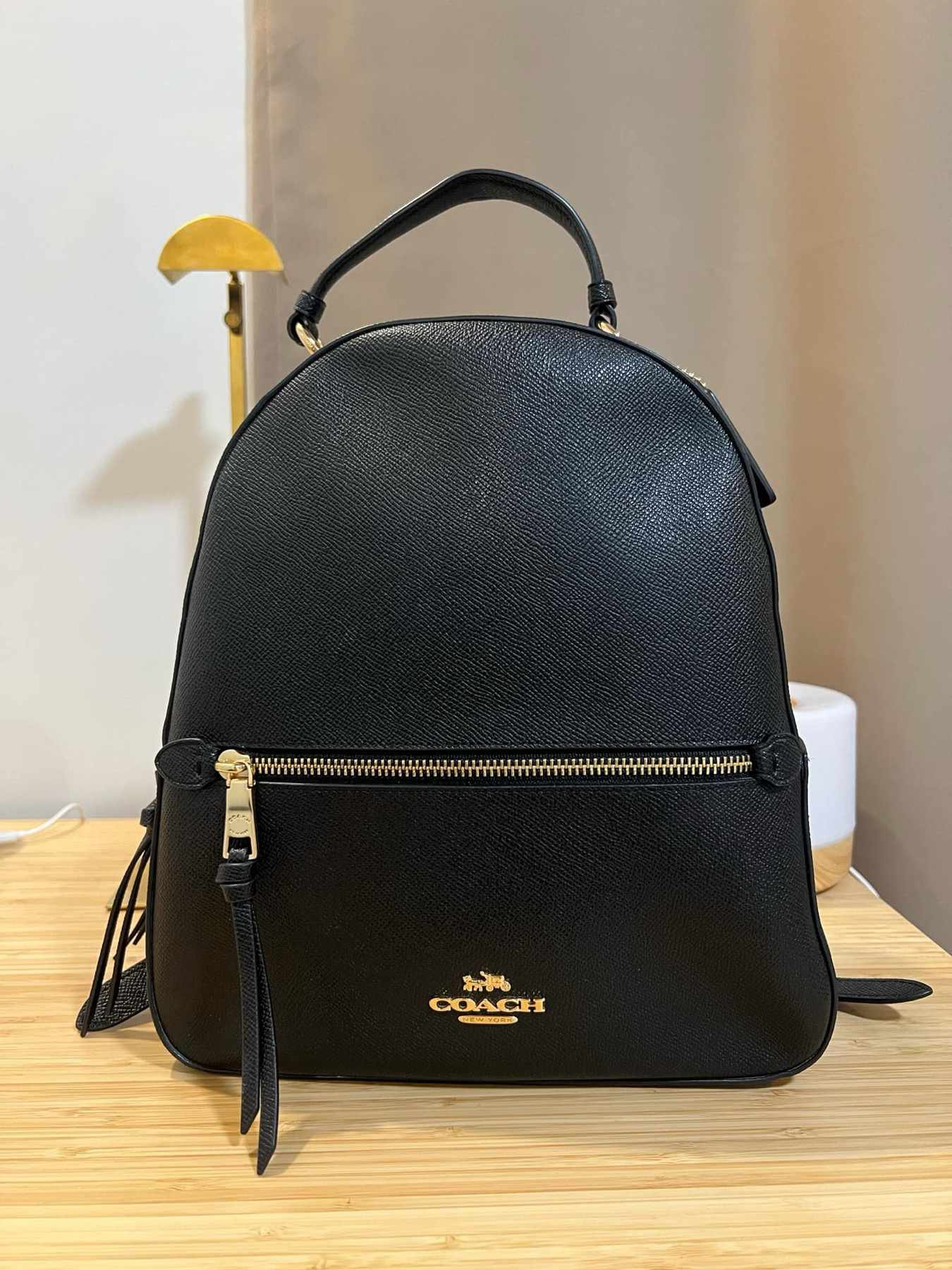 coach backpack price Outlet Court In Signature Canvas while the adjustable shoulder straps and top handle with a 2.5 drop offer versatility and comfort for any outing Coach Women's Court Backpack In