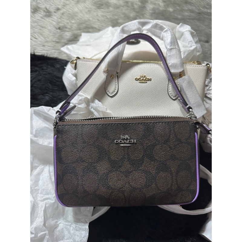 Newest Coach signature canvas bag in purple