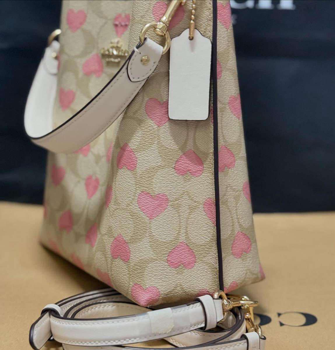 AUTHENTIC/ORIGINAL Preloved Coach Mollie Bucket Bag 22 In Signature Canvas With Heart Print Bag