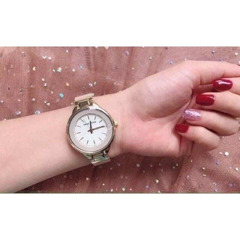 AK Klein Women's AK/1408CRCR Premium Crystal Accented Cream Bangle Watch