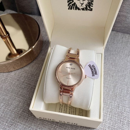 AK Klein Women's 2626RGRG Diamond-Accented Dial Rose Gold-Tone Bangle Watch