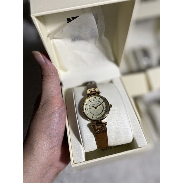 AK Klein Women's Gold-Tone Champagne Dial and Brown Leather Strap Watch 10/9442CHHY