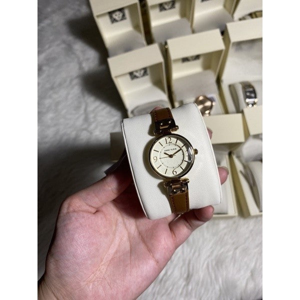 AK Klein Women's Gold-Tone Champagne Dial and Brown Leather Strap Watch 10/9442CHHY