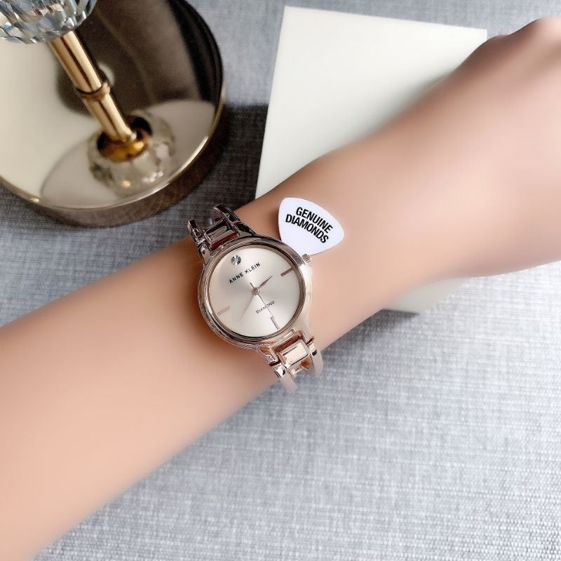 AK Klein Women's 2626RGRG Diamond-Accented Dial Rose Gold-Tone Bangle Watch