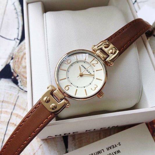 AK Klein Women's Gold-Tone Champagne Dial and Brown Leather Strap Watch 10/9442CHHY