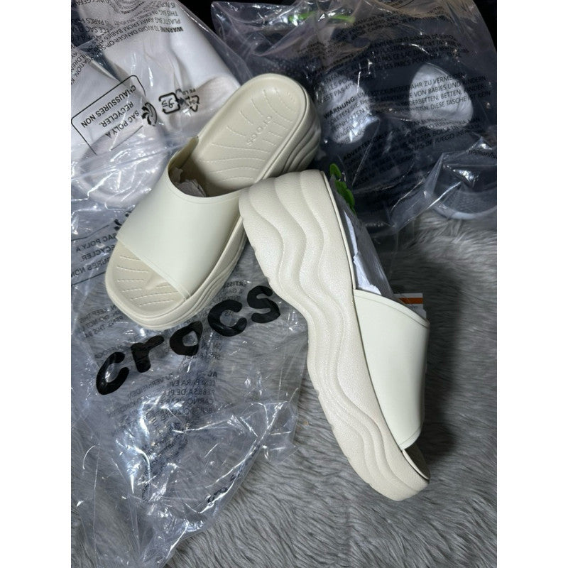 ORIG & IMPORTED Crocs Women’s Skyline Wedge Platform Slides in Bone/Beige