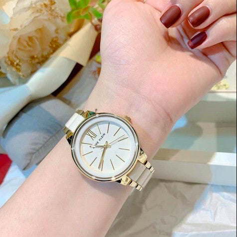 ORIG & IMPORTED AK Klein Women's AK/1412IVGB Gold-Tone and Ivory Resin Bracelet Watch