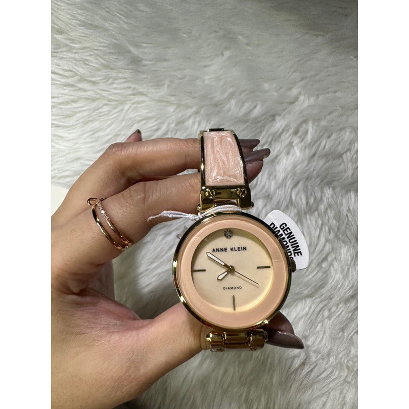 AK Klein AK/2512LPGB Diamond-Accented Gold-Tone and Blush Pink White Marbleized Bangle Watch