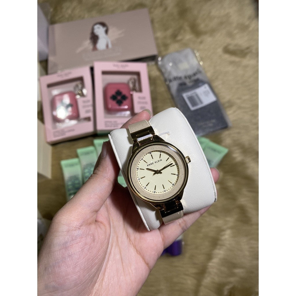 AK Klein Women's AK/1408CRCR Premium Crystal Accented Cream Bangle Watch