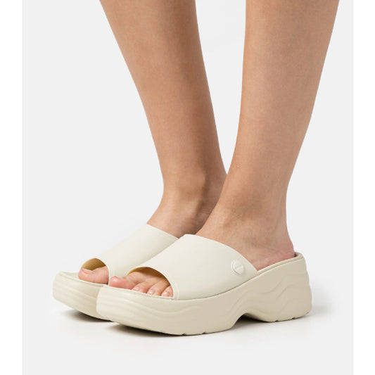 ORIG & IMPORTED Crocs Women’s Skyline Wedge Platform Slides in Bone/Beige