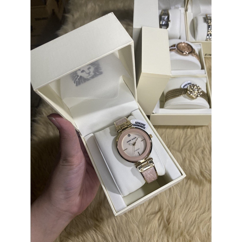 AK Klein AK/2512LPGB Diamond-Accented Gold-Tone and Blush Pink White Marbleized Bangle Watch