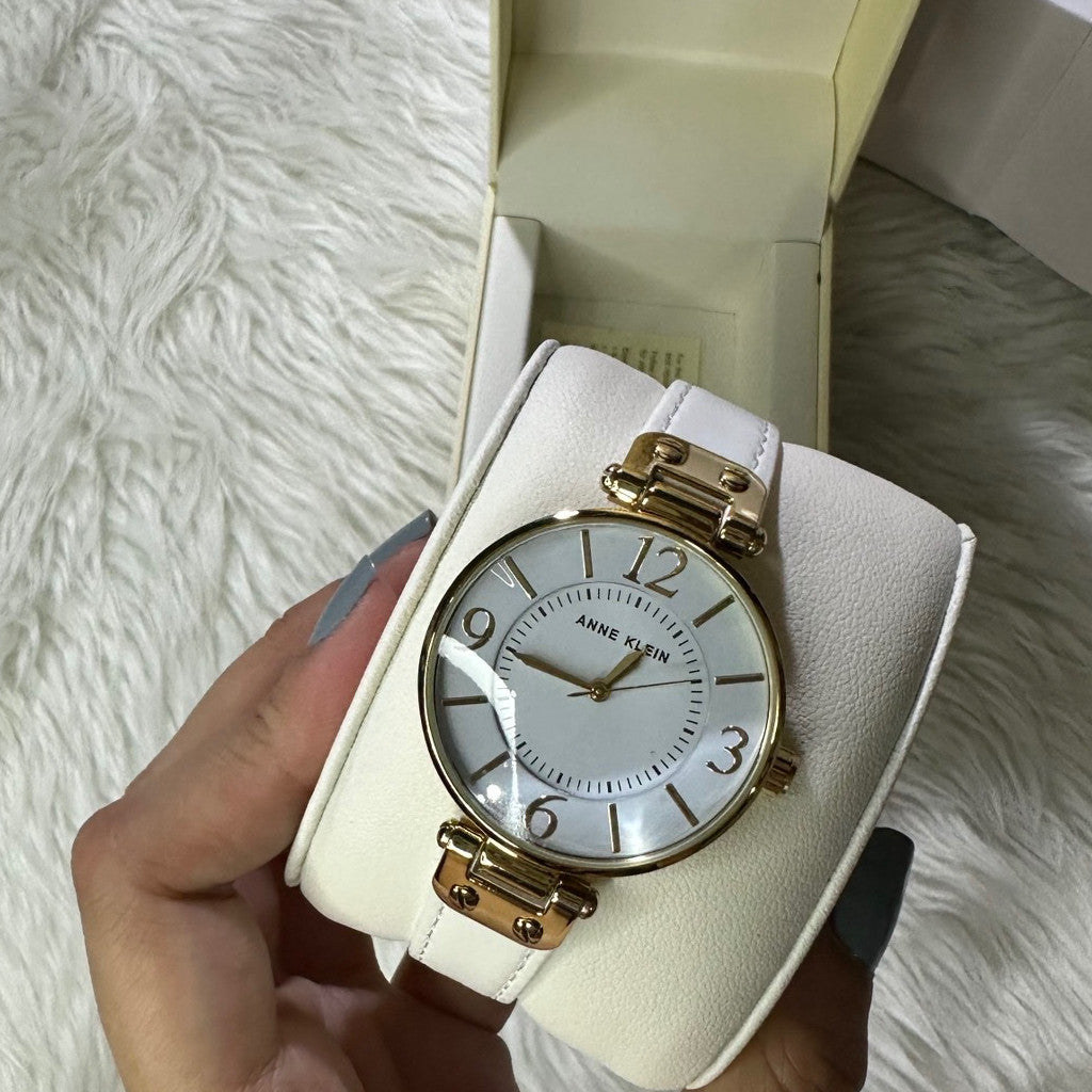 ORIG & IMPORTED AK Klein Women's 10-9168WTWT Gold-Tone and White Leather Strap Watch