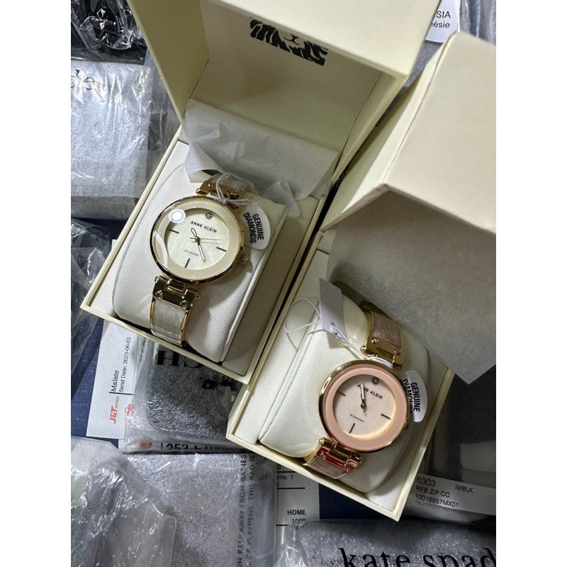 AK Klein AK/2512LPGB Diamond-Accented Gold-Tone and Blush Pink White Marbleized Bangle Watch