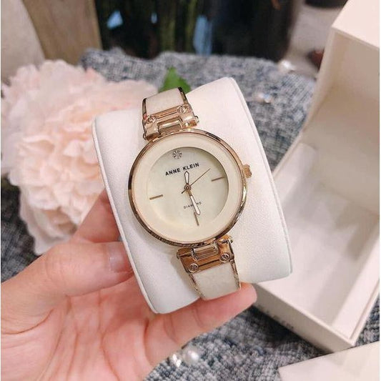 AK Klein Women's AK/2512IVGB Diamond-Accented Dial Gold Tone Ivory White Bangle Watch