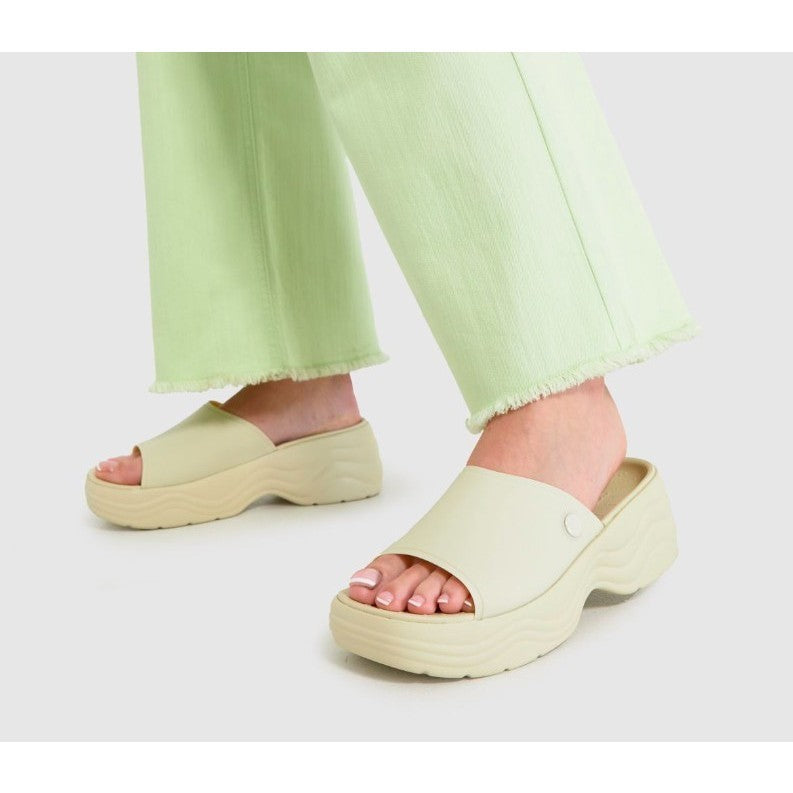 ORIG & IMPORTED Crocs Women’s Skyline Wedge Platform Slides in Bone/Beige