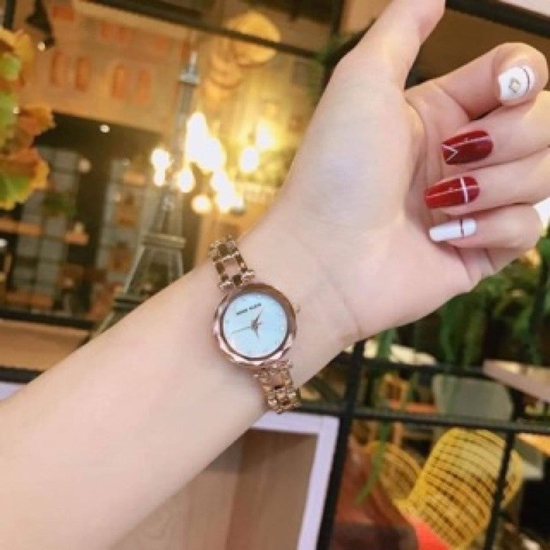 AK Klein AK/3120MPRG Premium Crystal Accented Rose Gold-Tone Open Bracelet Women's Watch