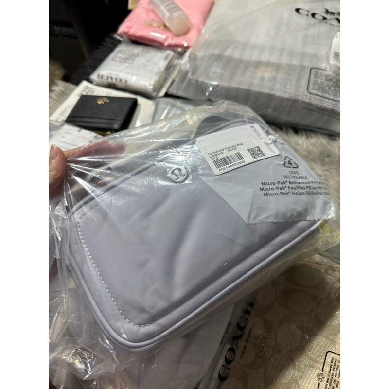 ORIG & IMPORTED Lululemon Crossbody Camera Bag 2L in Silver Drop