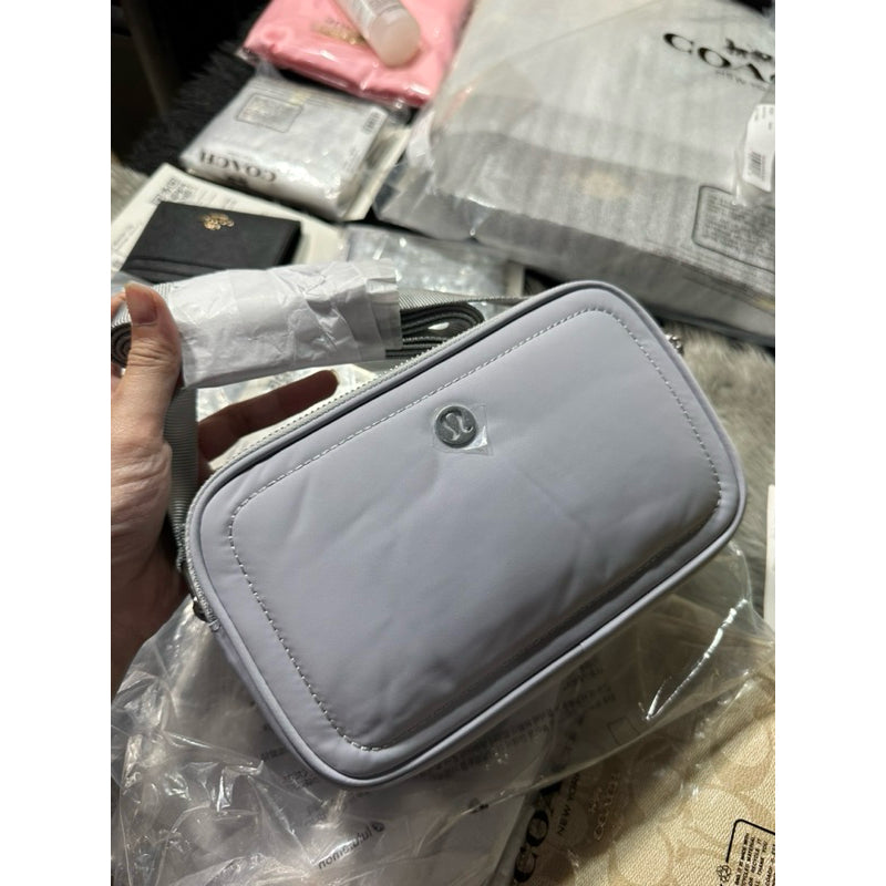 ORIG & IMPORTED Lululemon Crossbody Camera Bag 2L in Silver Drop