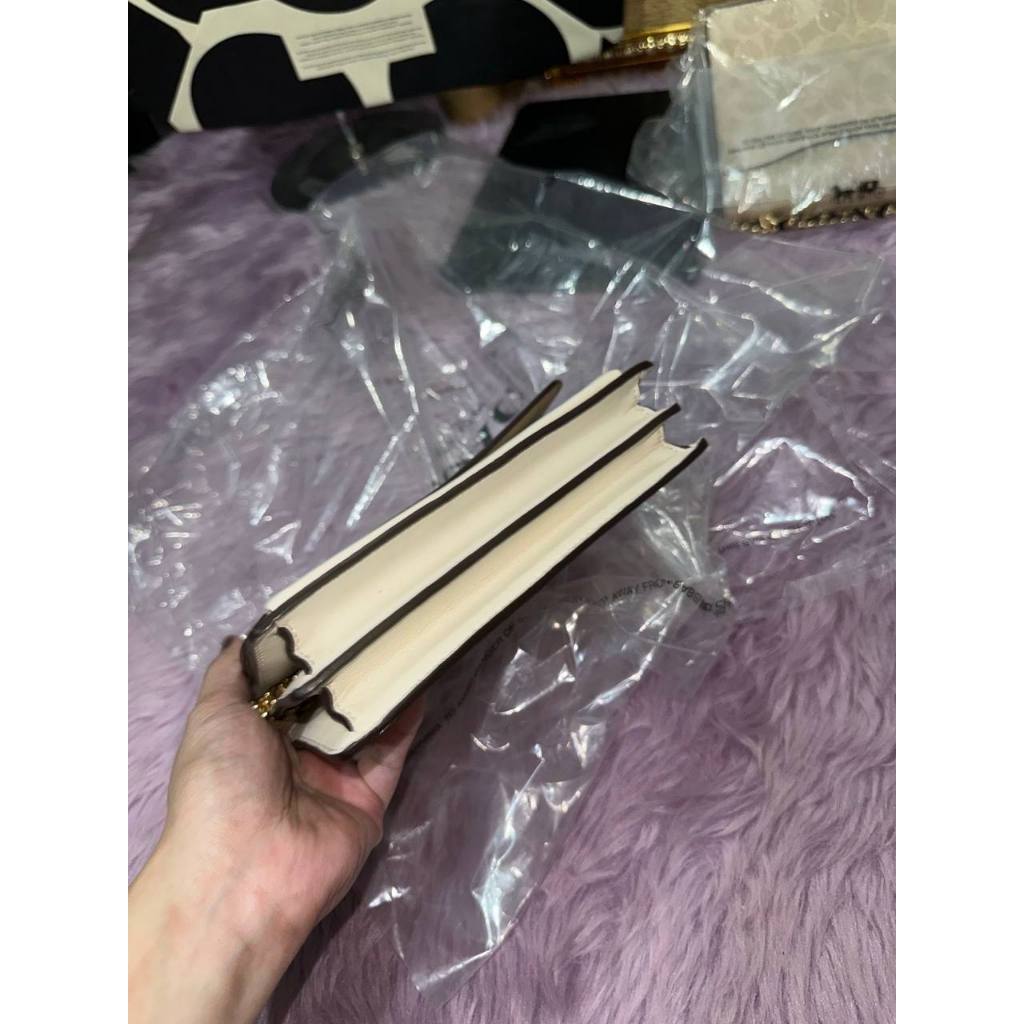 ORIG & IMPORTED CCH Mini Klare Crossbody Small Bag In Signature Canvas in SAND/CHALK