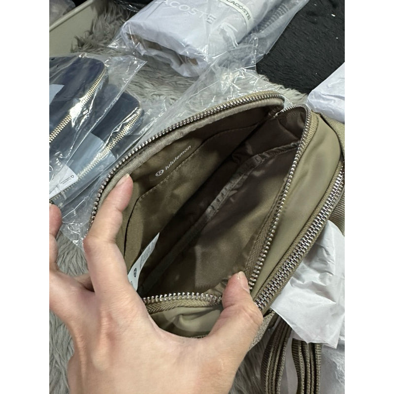ORIG & IMPORTED Lululemon Crossbody Camera Bag 2L in Brown