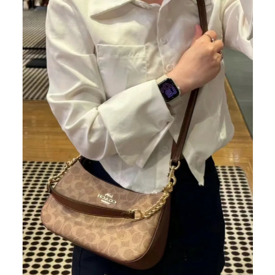 ORIG & IMPORTED CCH Teri Shoulder Bag In Signature Canvas in Tan/Brown