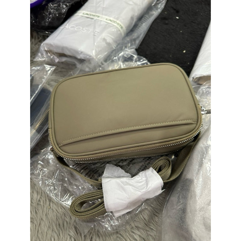 ORIG & IMPORTED Lululemon Crossbody Camera Bag 2L in Brown