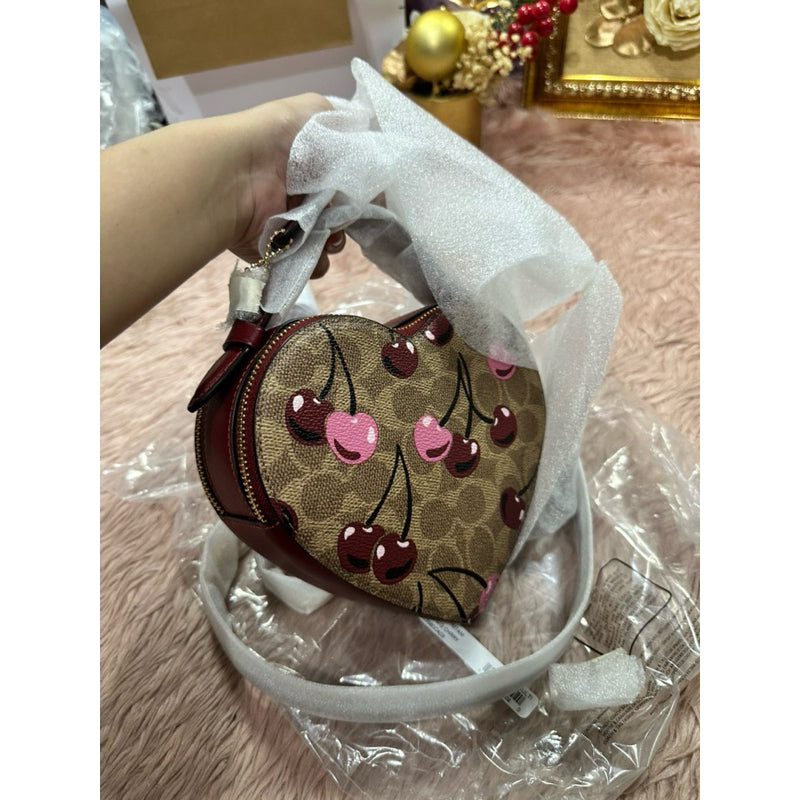 ORIG & IMPORTED CCH Heart Crossbody Bag In Signature Canvas With Cherry Print Brown Bag