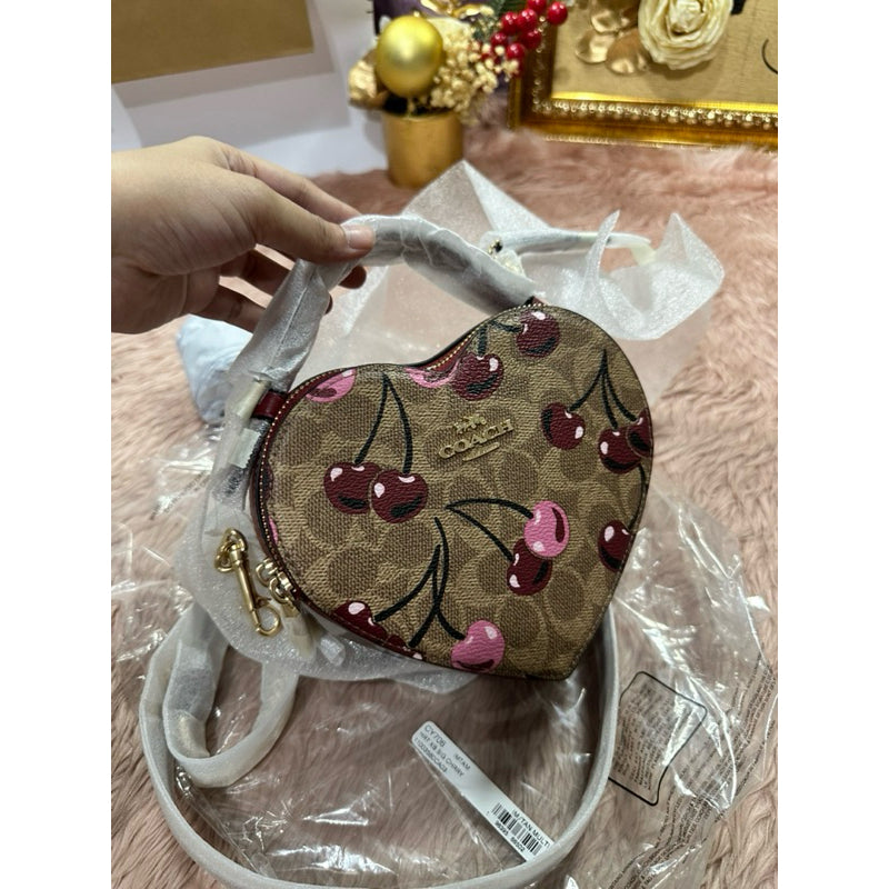 ORIG & IMPORTED CCH Heart Crossbody Bag In Signature Canvas With Cherry Print Brown Bag