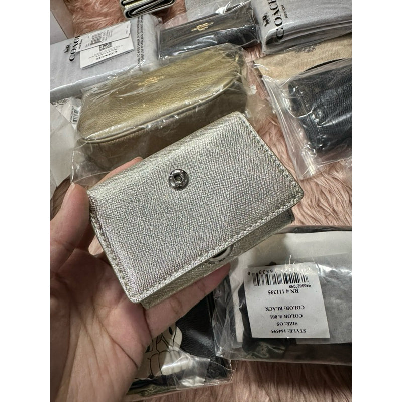 ORIG & IMPORTED WITH FLAW MJ The Snapshot Mini Trifold Wallet in Metallic Silver