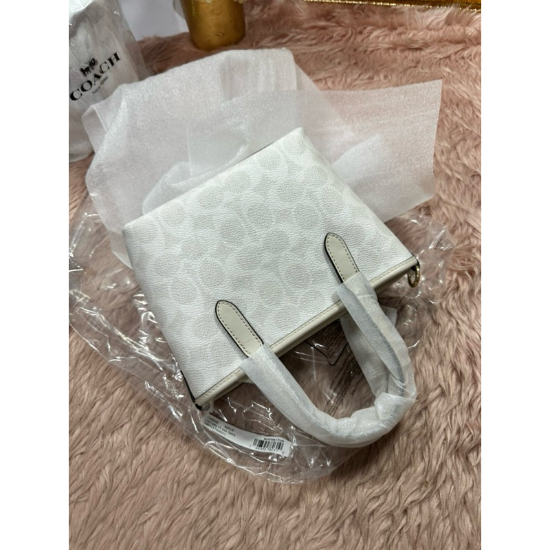 ORIG & IMPORTED CCH City Mini Tote Bag In Signature Canvas White Bag