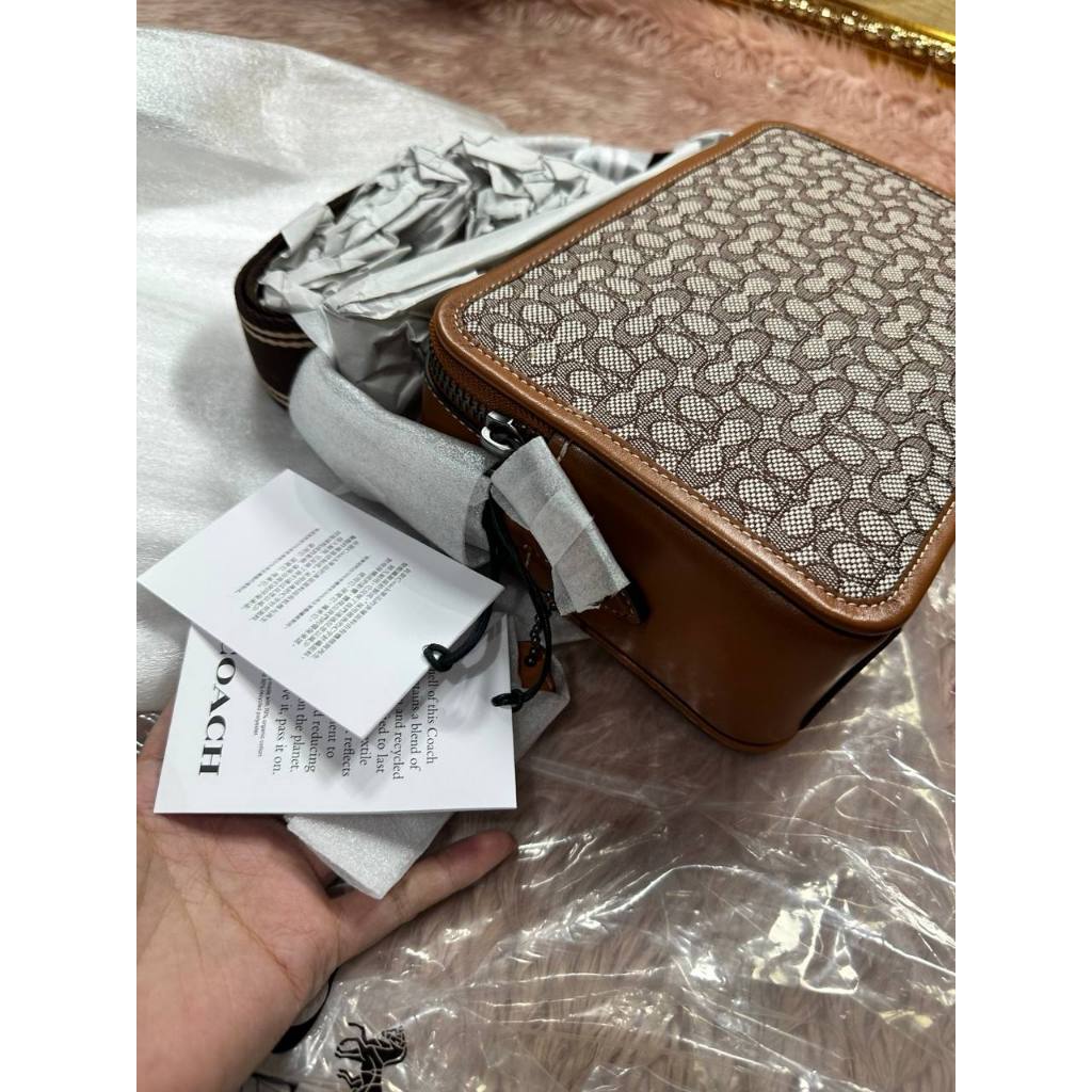 ORIG CCH RETAIL CHARTER CROSSBODY 24 IN MICRO SIGNATURE JACQUARD BROWN