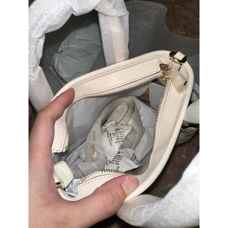 ORIG & IMPORTED CCH City Mini Tote Bag In Signature Canvas White Bag
