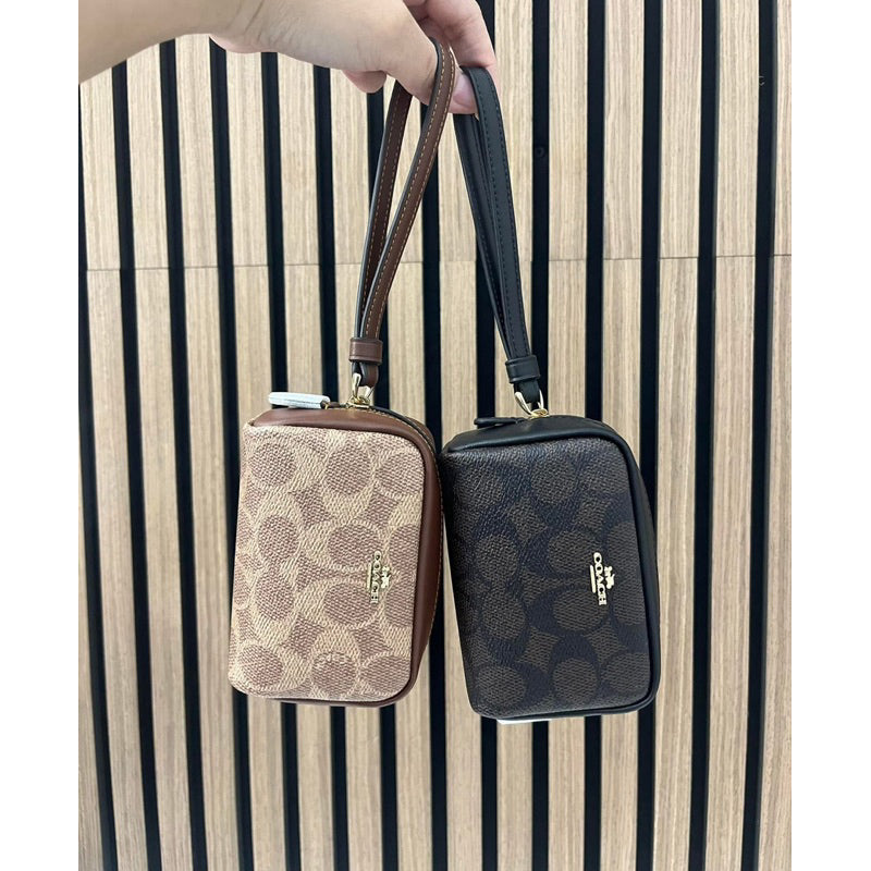 ORIG & IMPORTED CCH Pouch Wristlet Wallet In Signature Canvas