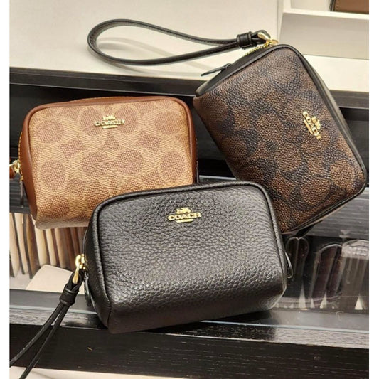 ORIG & IMPORTED CCH Pouch Wristlet Wallet In Signature Canvas